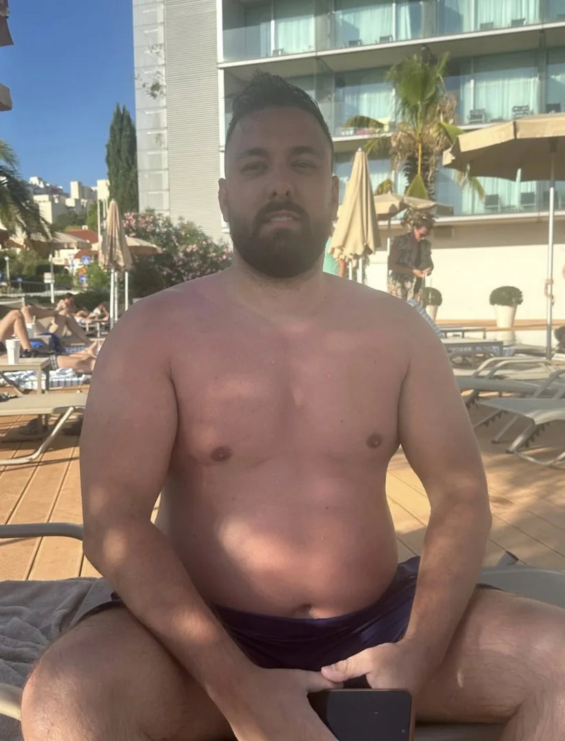 Faheem before: bloated stomach from the front
